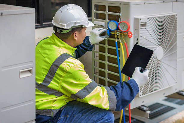 Professional Hvac technician working in Assonet, MA